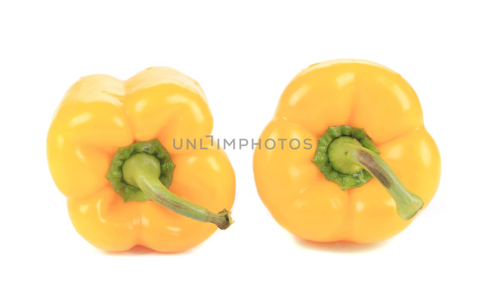 Sweet yellow bell peppers. Isolated on a white background.