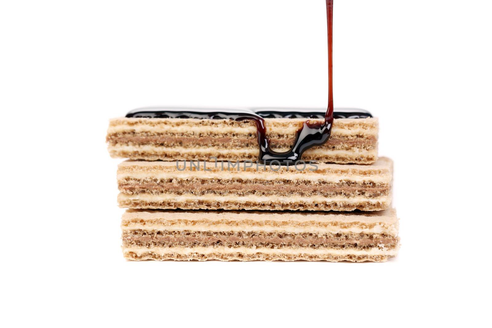 Coated stake wafers of chocolate. Isolated on a white background.