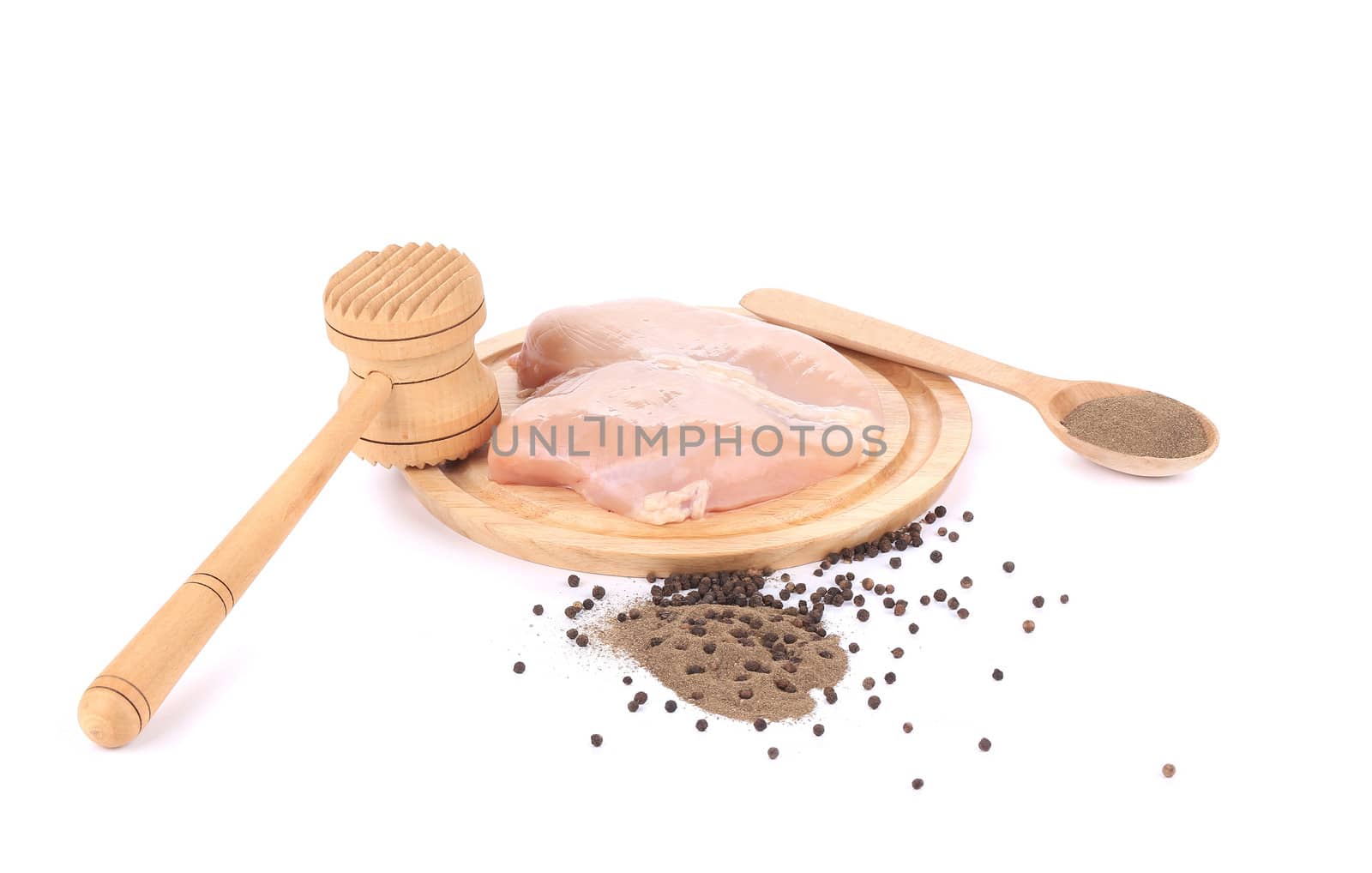 Raw chicken breast on platter. Isolated on a white background.