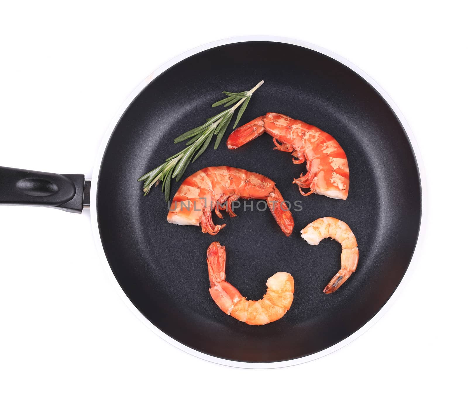 Boiled shrimps in frying pan. Isolated on a white background.