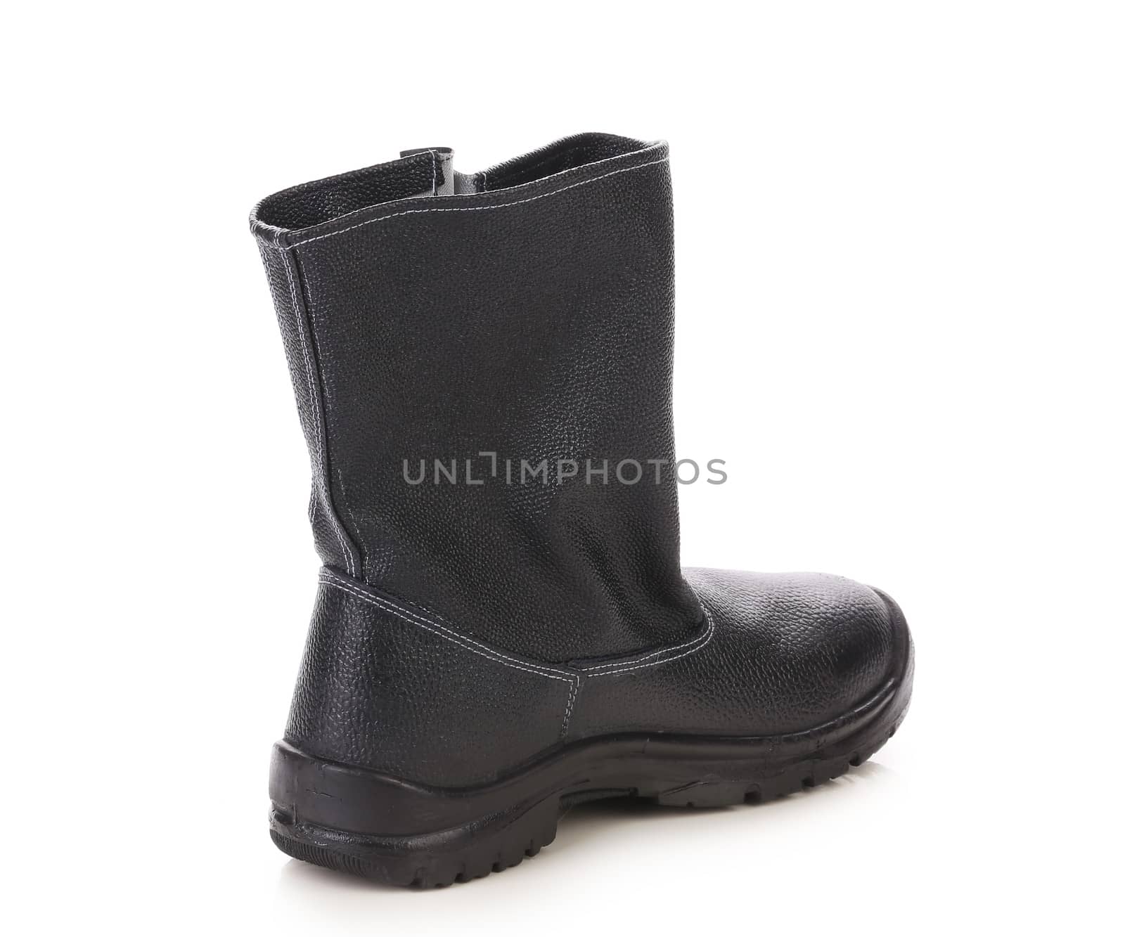 Black leather boot. Isolated on a white background.
