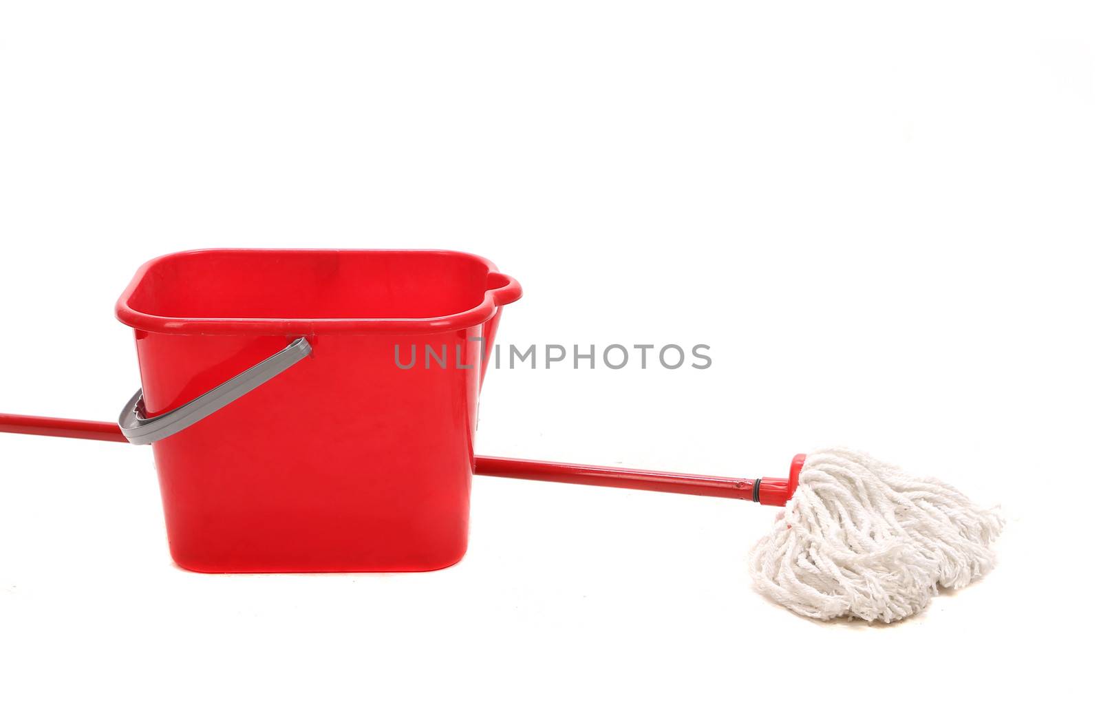 Mop and red bucket. Isolated on a white background.