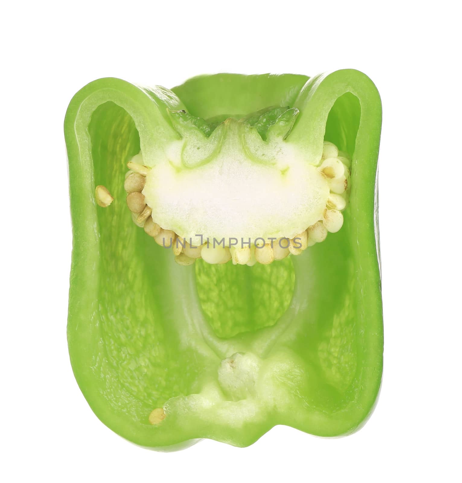 Halved green pepper. Isolated on a white background.