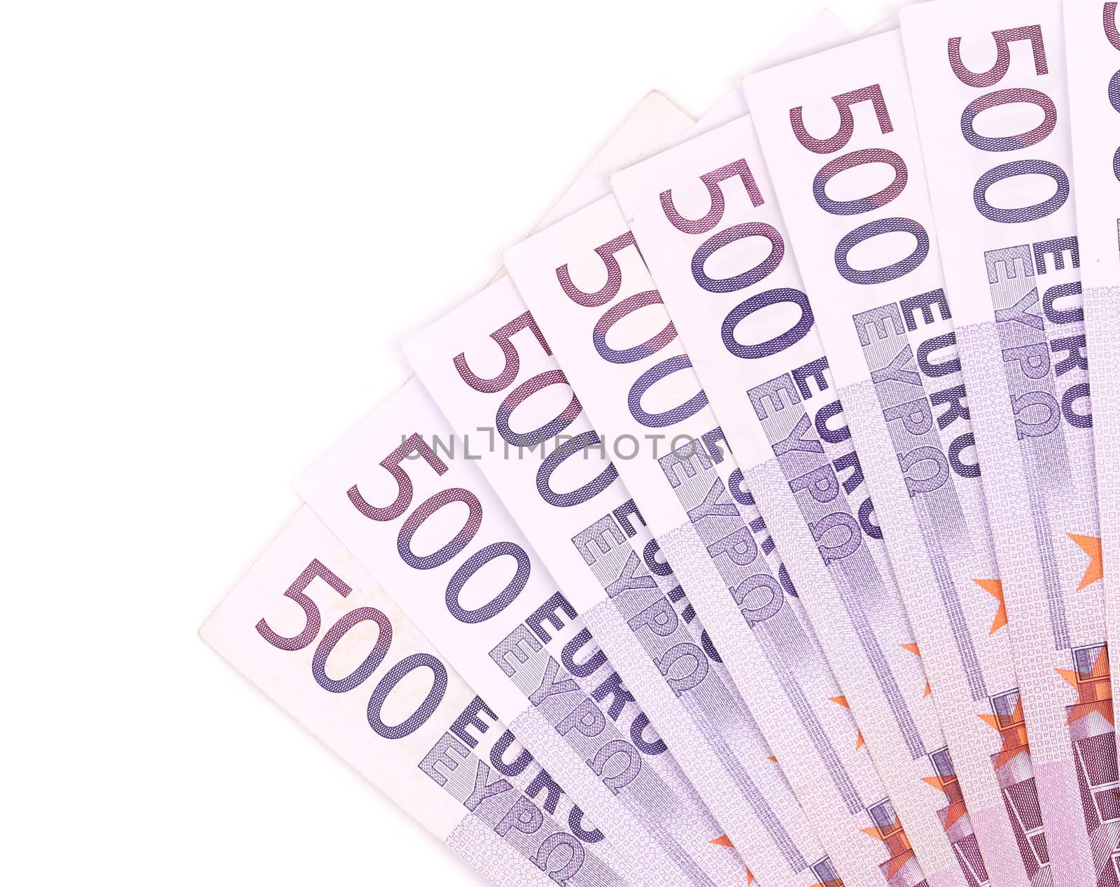 Five hundred euro notes aligned. Isolated on a white background.