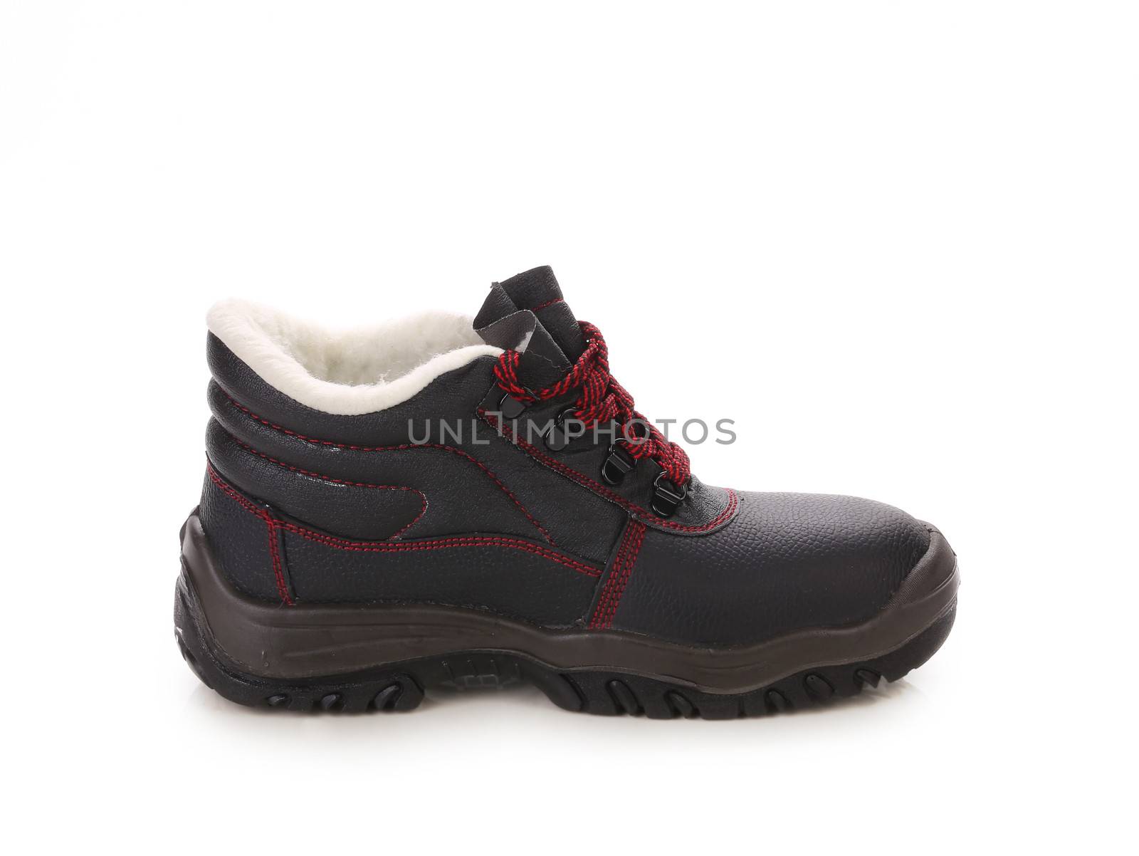 Black winter boot. Isolated on a white background.