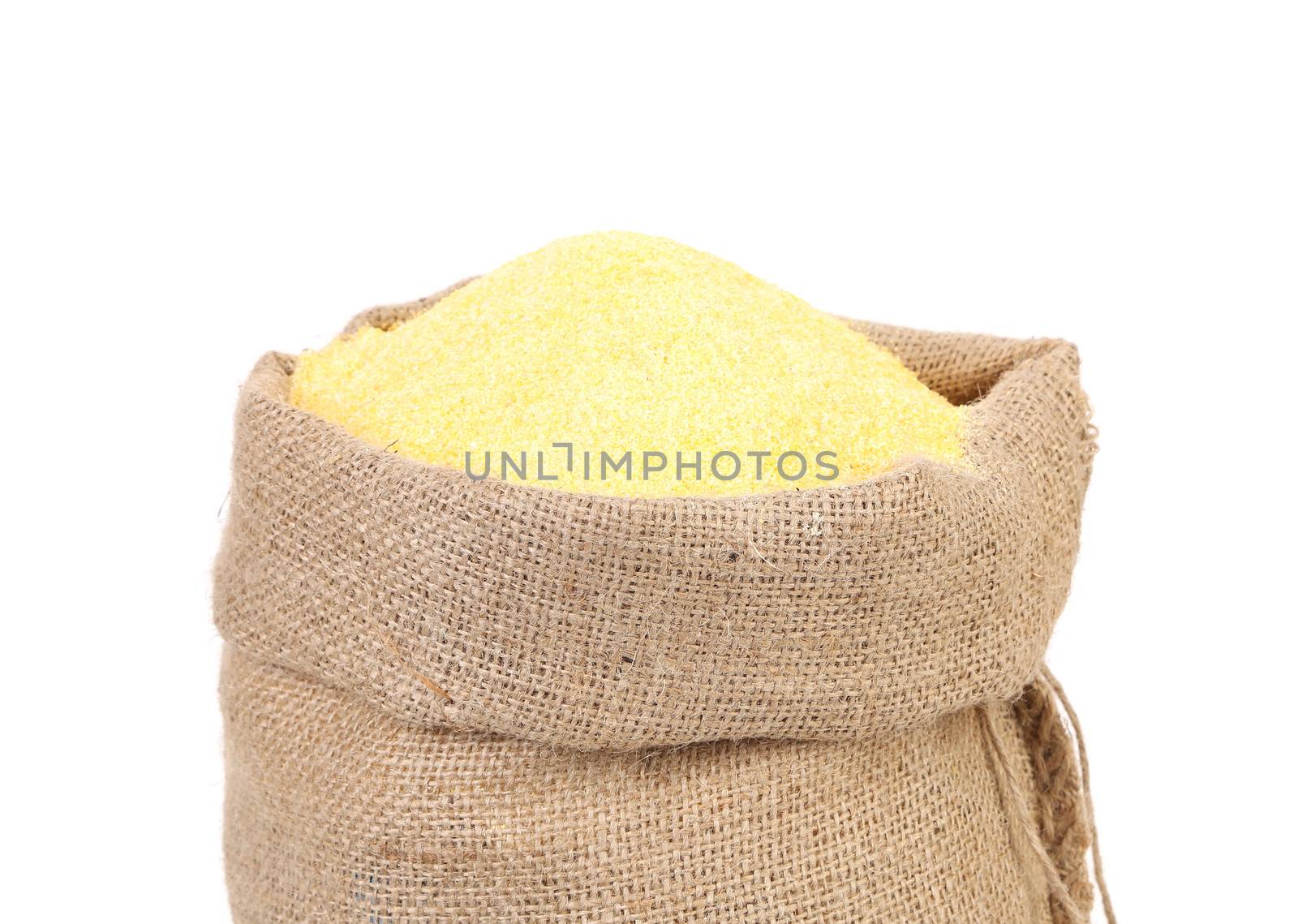 Canvas bag with cornmeal. Isolated on a white background.