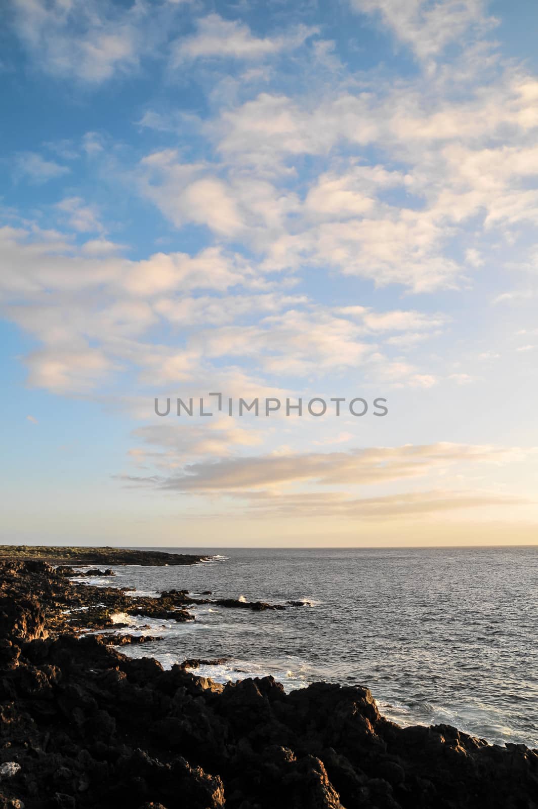 Cloudscape, Colored Clouds at Sunset near the Ocean