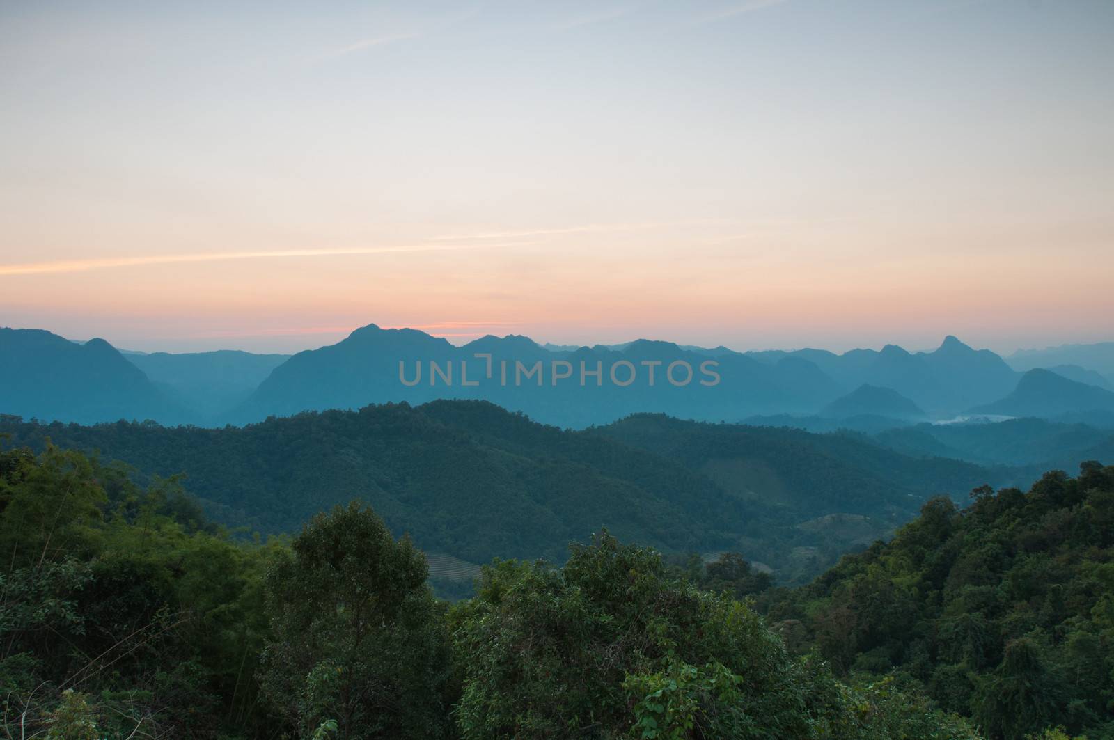 Majestic sunset in the mountains landscape. by Sorapop