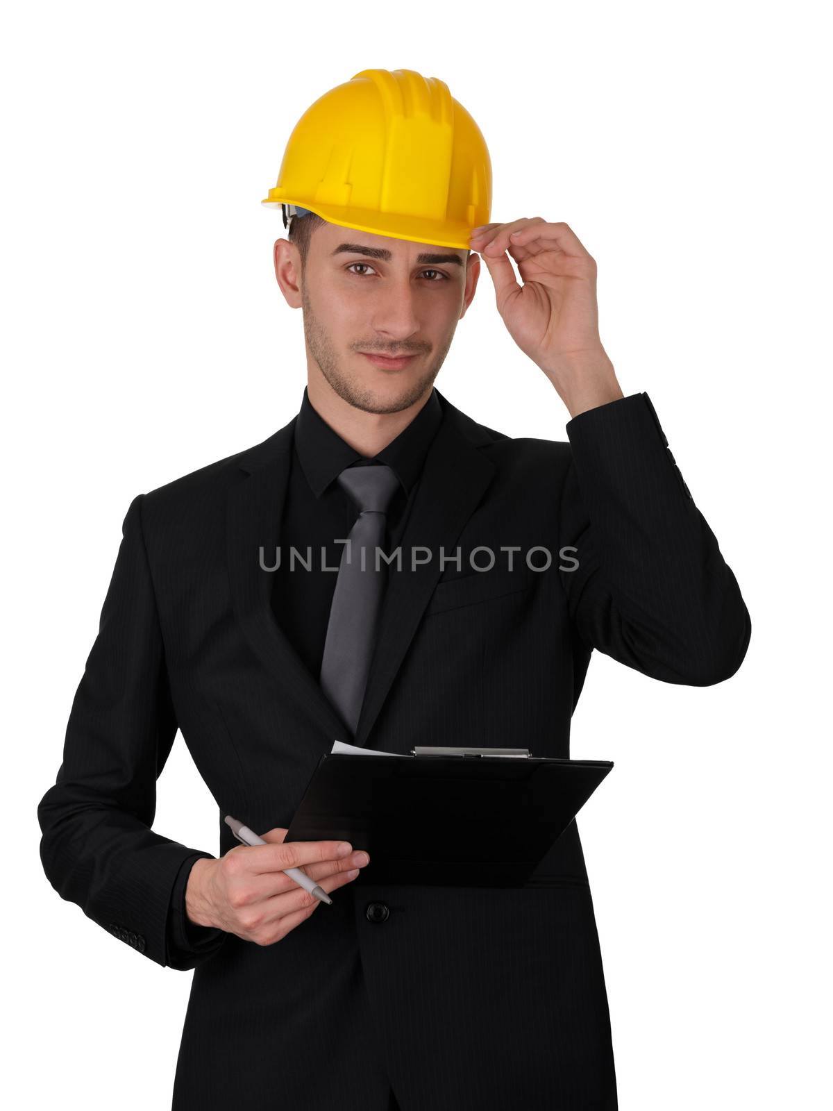 Young man wearing a hard hat and holding a clipboard.