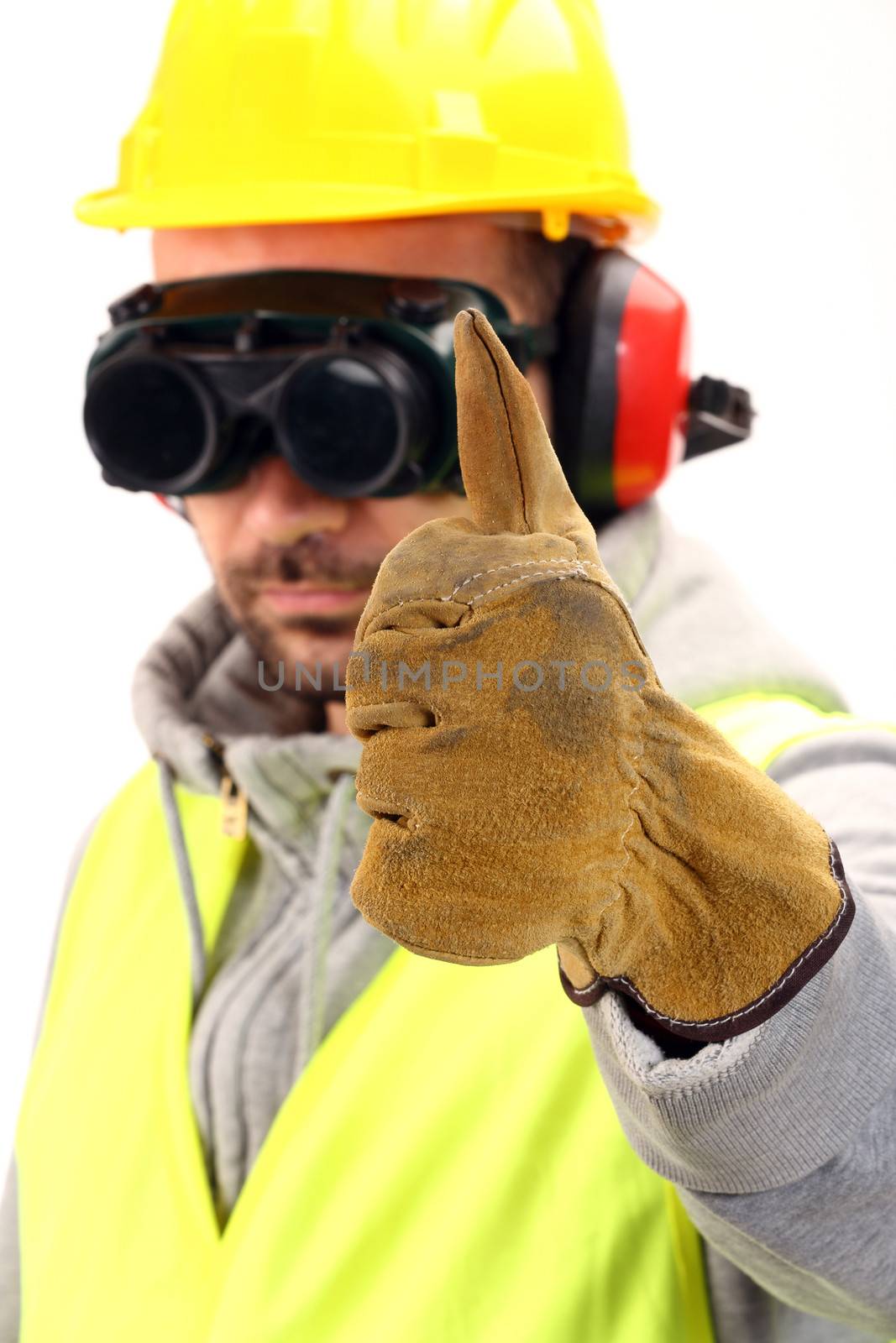Worker with protective gear and thumbs up