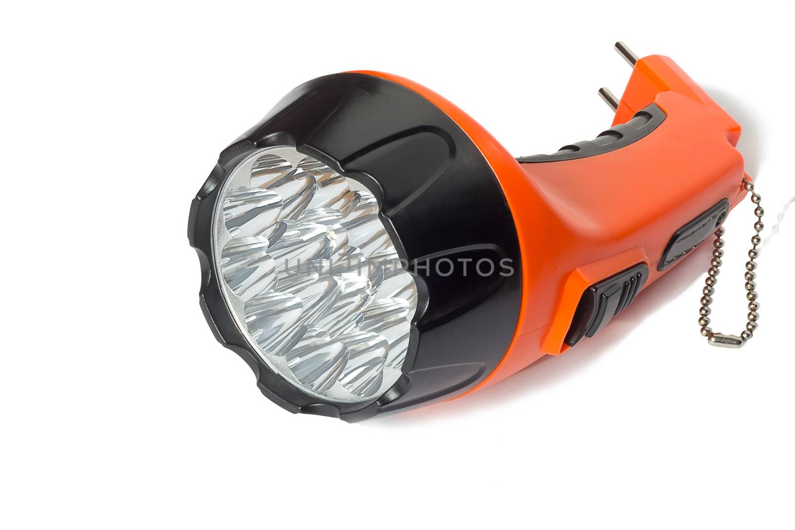 Comfortable small battery electric torch orange. Presented on a white background.