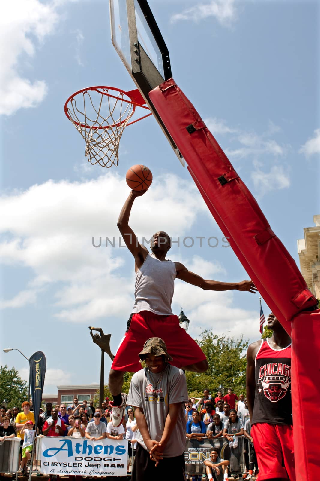 Man Jumps Over A Person To Dunk In Outdoor Contest by BluIz60