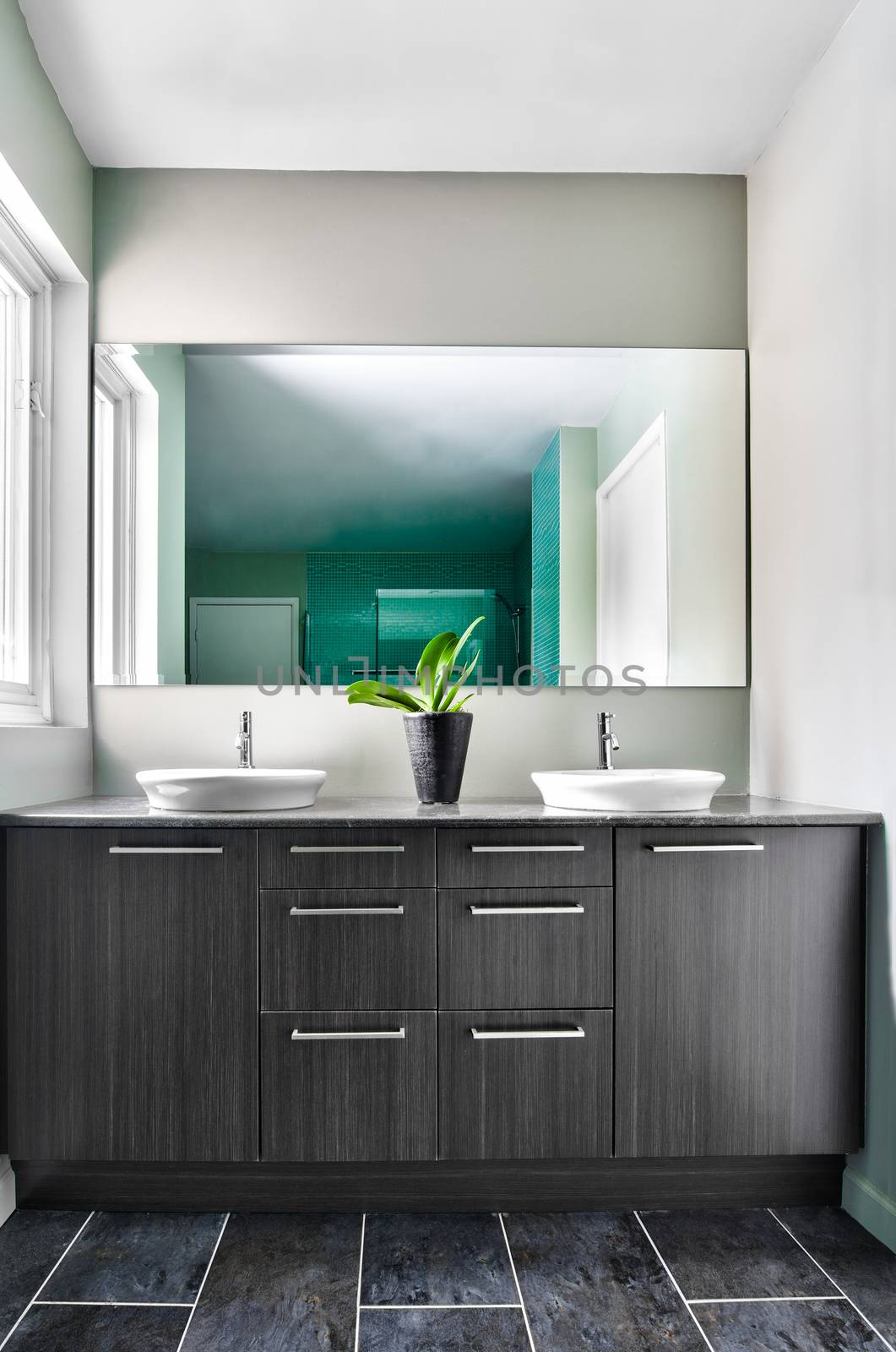 Modern Bathroom with big mirror. Soft Green Pastel Colors