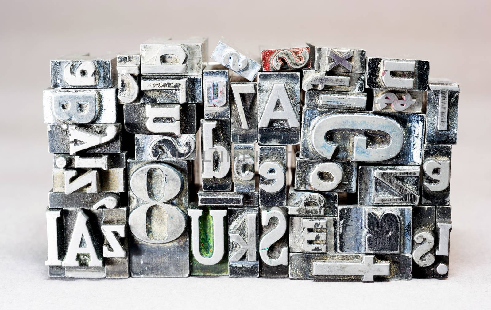 Old metal blank printing press typeset all stacked up