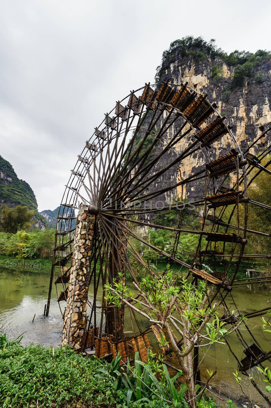 The waterwheel of the mingshi pastoral in Daxin, Guangxi province of China.