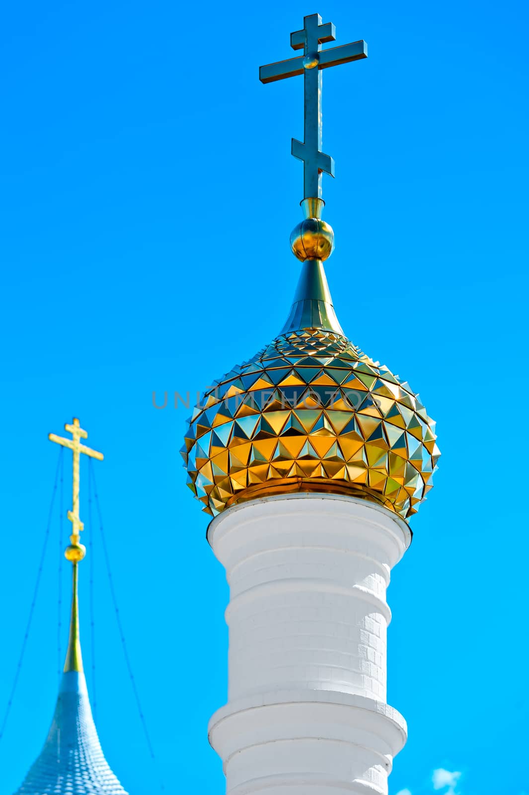 golden dome of the church against the blue sky by kosmsos111