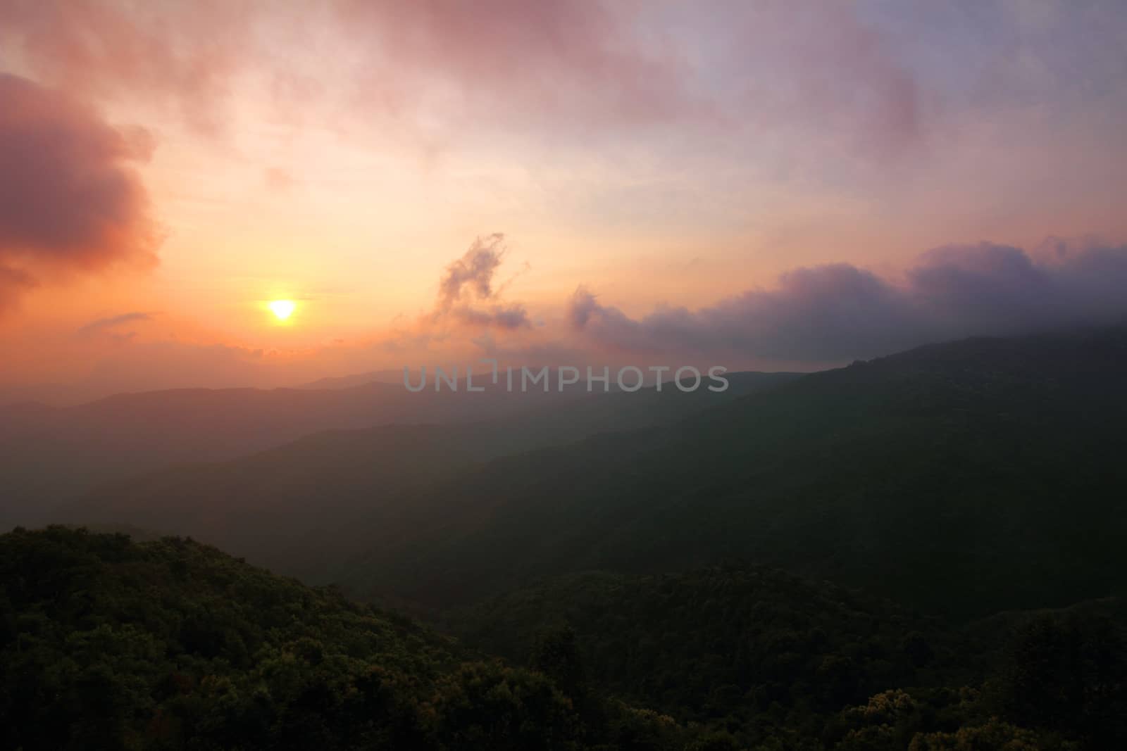 Summer landscape in the mountain with the sunset