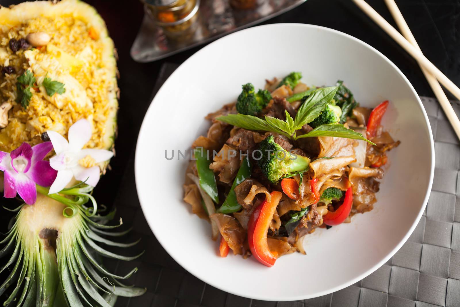 Drunken Noodle and Pineapple Fried Rice by graficallyminded
