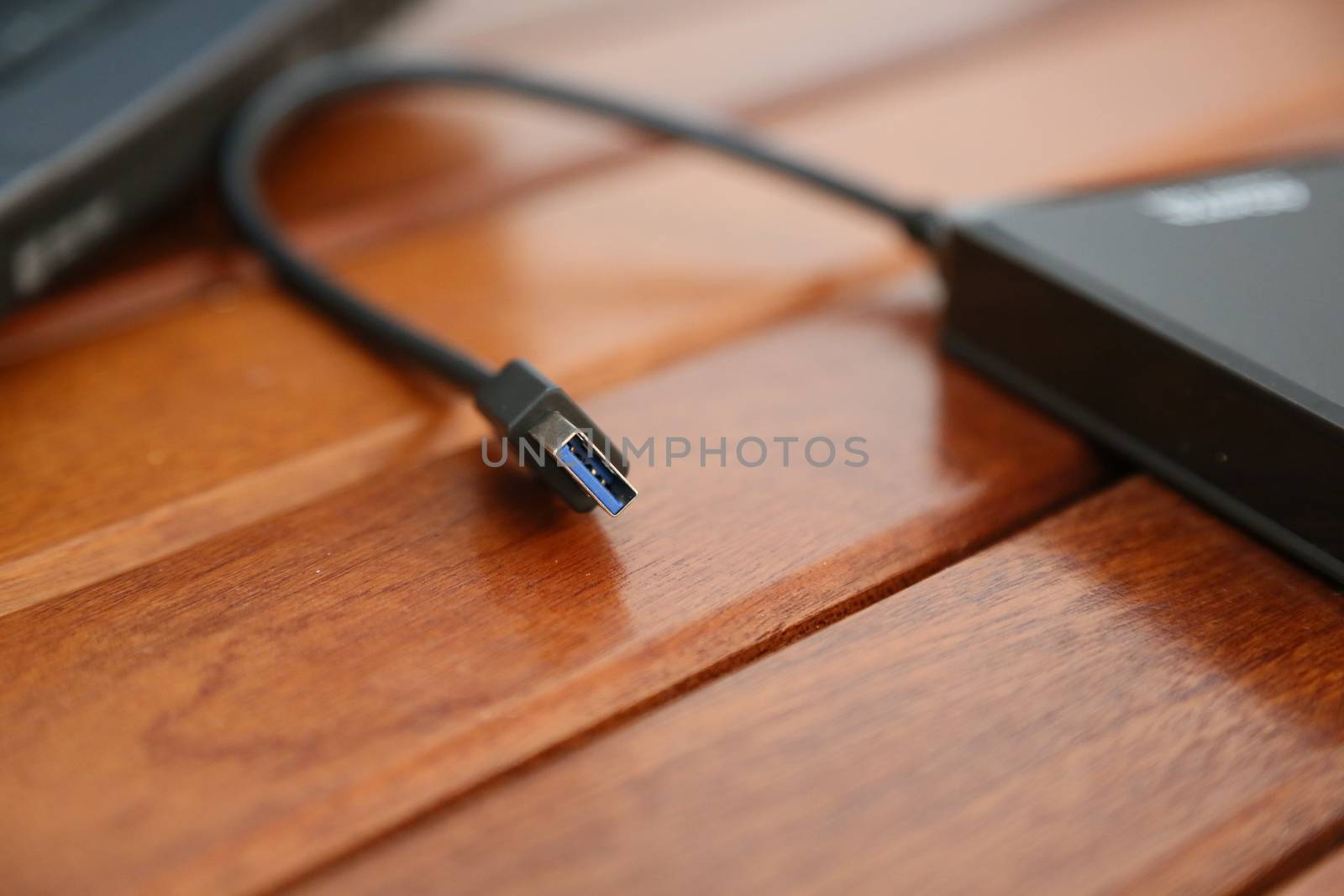 USB 3.0 connector of a hard drive by tolikoff_photography