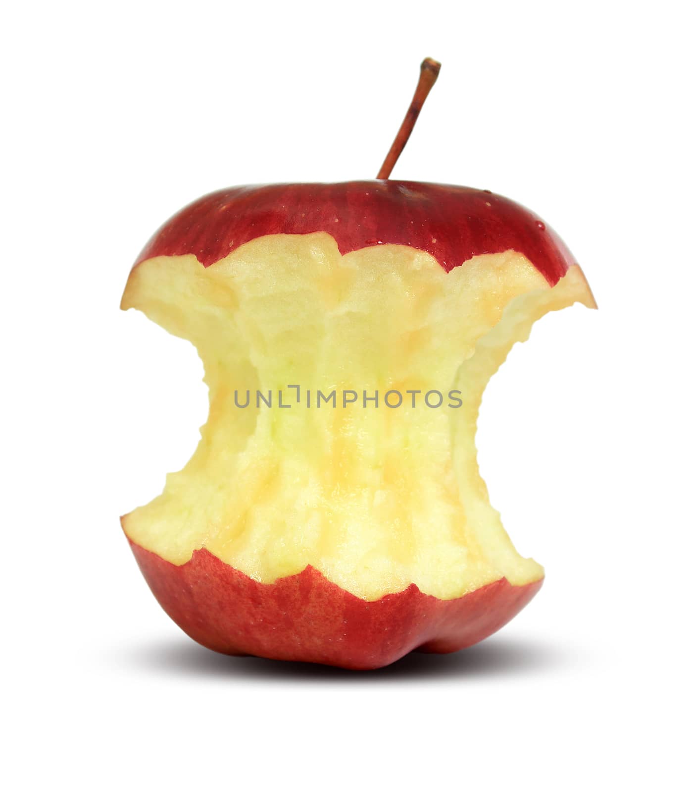 Red apple core on a white background