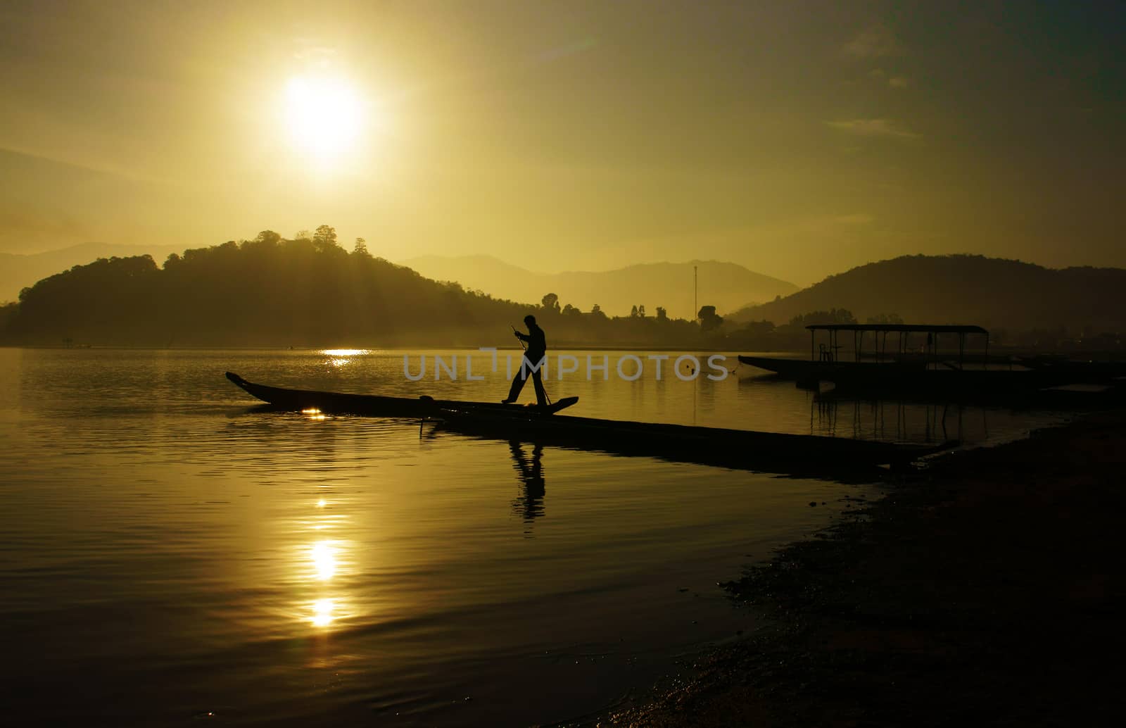 beautiful sunrise on lake by xuanhuongho