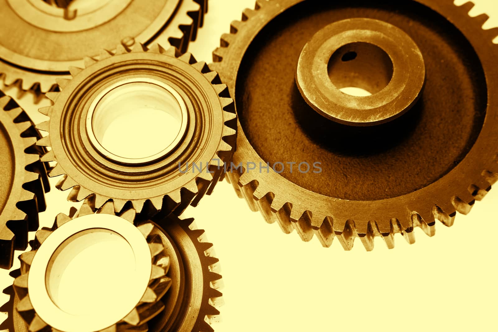 Metal cog gears bonding together 