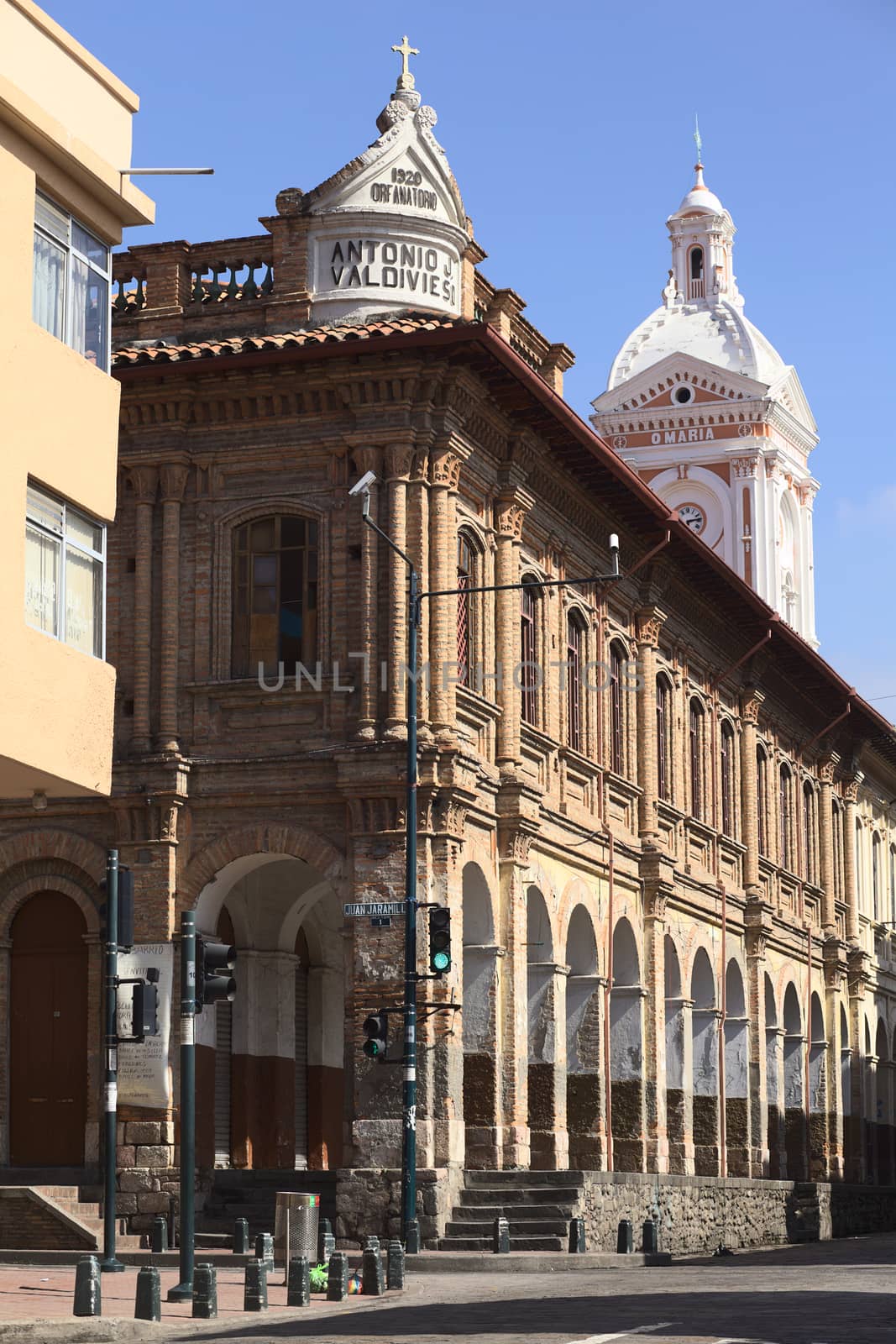 CUENCA, ECUADOR - FEBRUARY 13, 2014: The building of the San Francisco Parish on the corner of the streets Juan Jaramillo and Padre Aguirre on February 13, 2014 in the city center of Cuenca in Ecuador