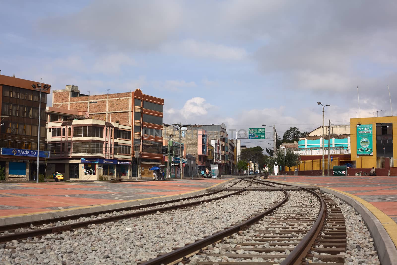 RIOBAMBA, ECUADOR - FEBRUARY 16, 2014: Rails leading out of the train station of Riobamba in the direction of the famous Nariz del Diablo (Devil's Nose) on February 16, 2014 in Riobamba, Ecuador