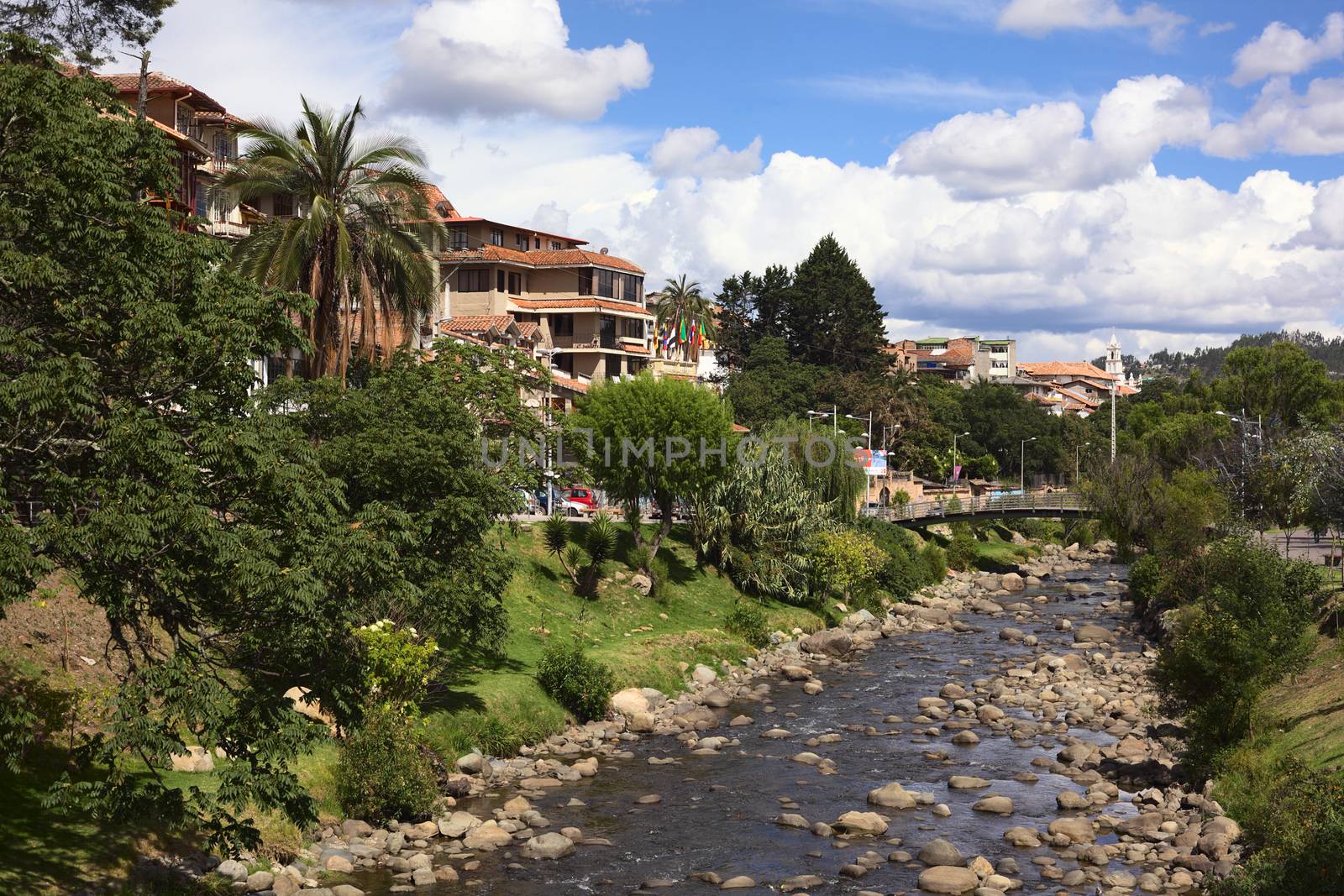 CUENCA, ECUADOR - FEBRUARY 13, 2014: View of the River Tomebamba from the bridge Puente del Centenario on February 13, 2014 in Cuenca, Ecuador