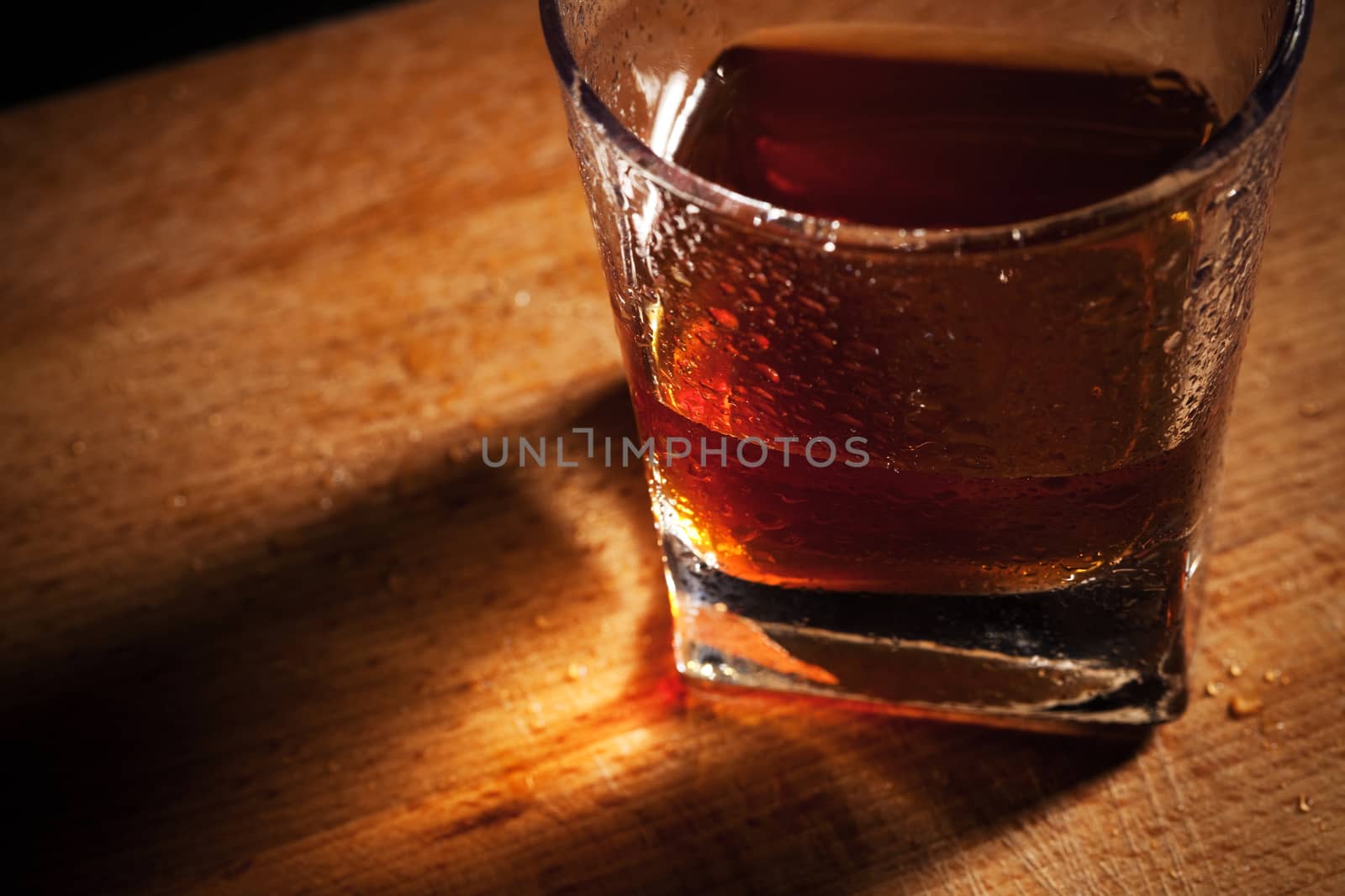 whisky on a wooden table by terex