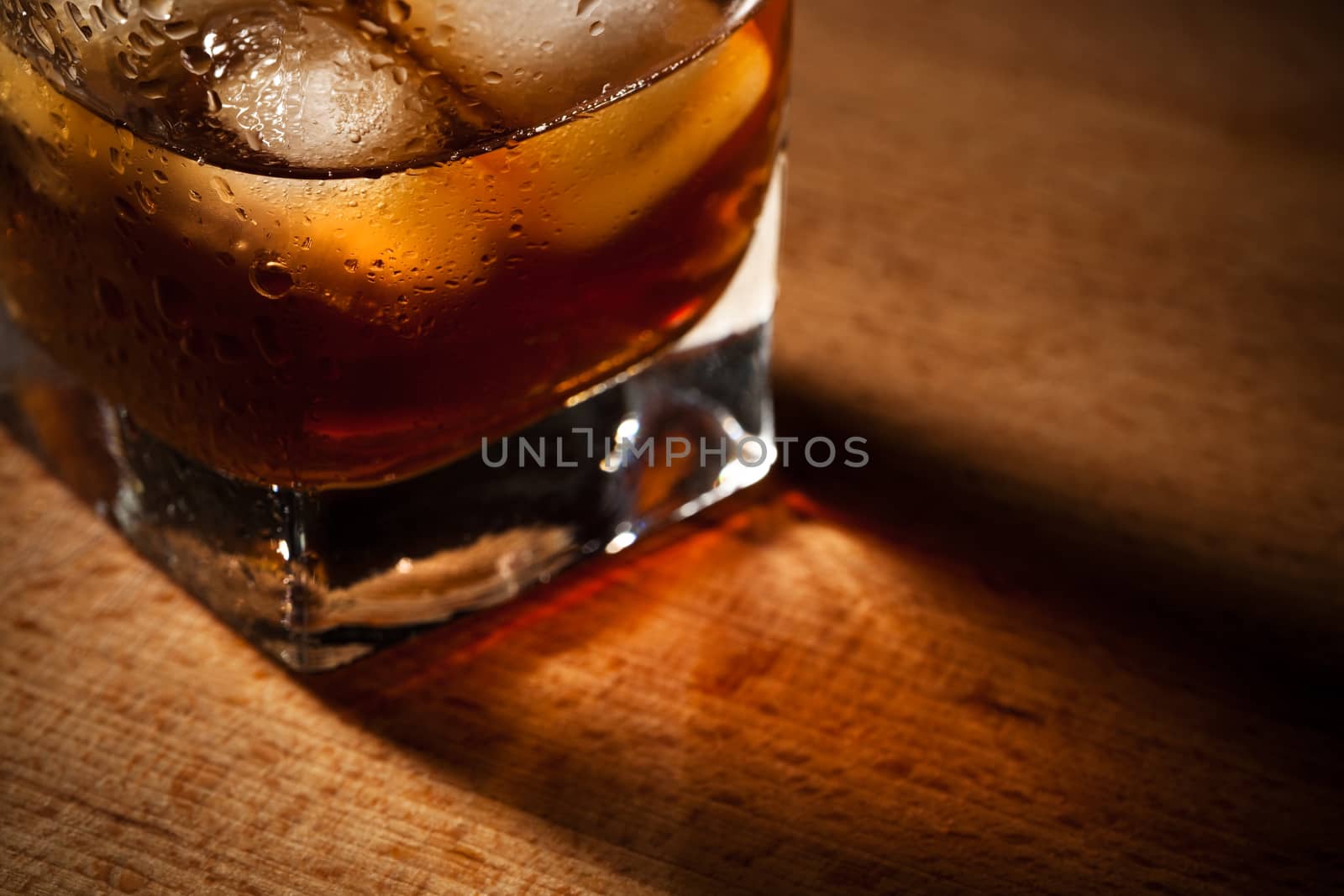 glasses from whiskey on a wooden table