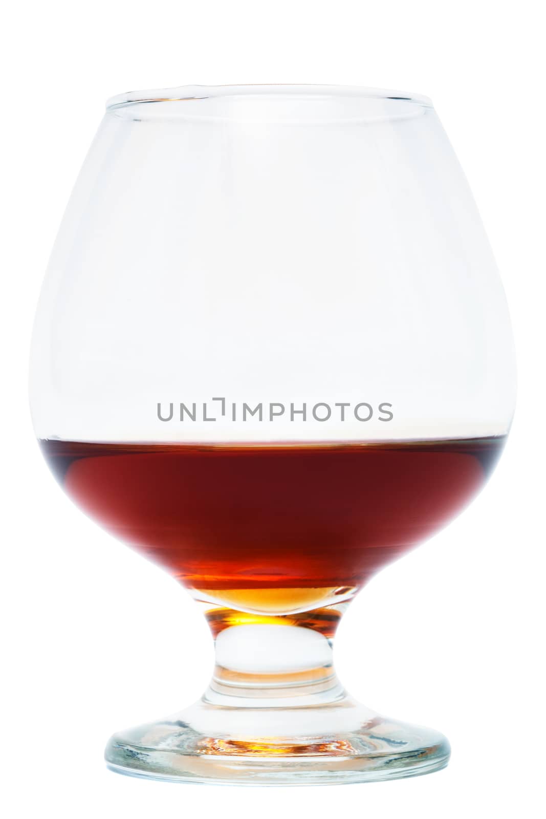 nice glass of cognac on a white background