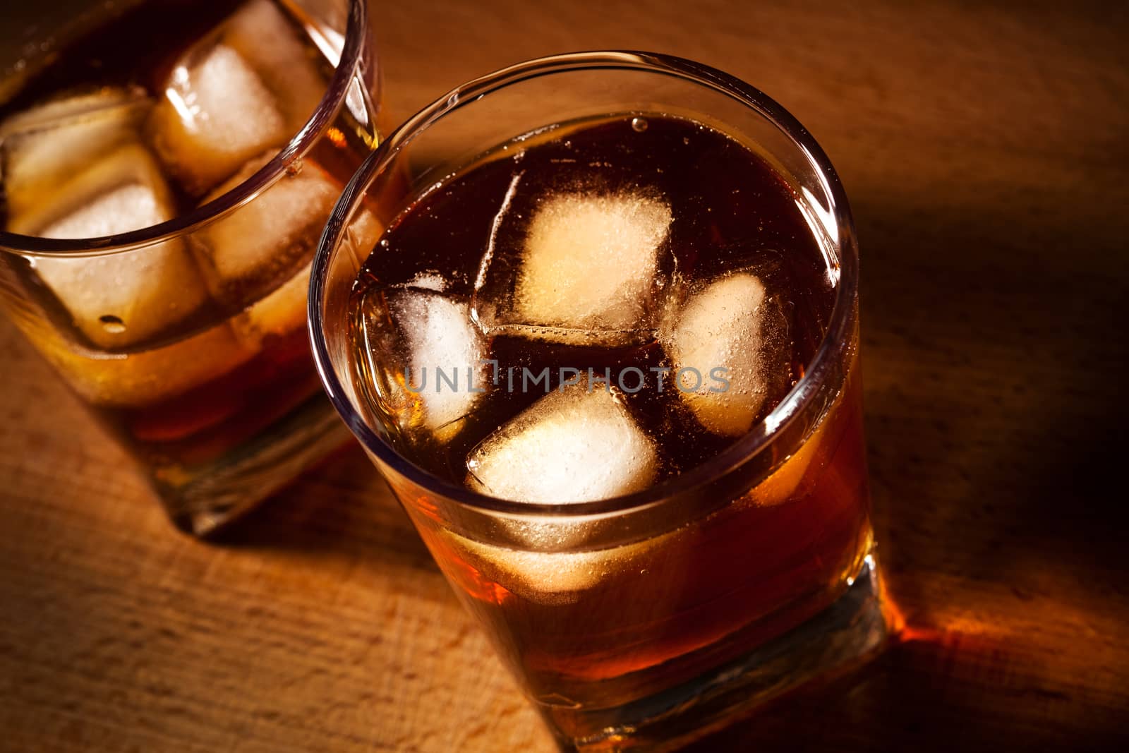 glasses from whisky on a wooden table