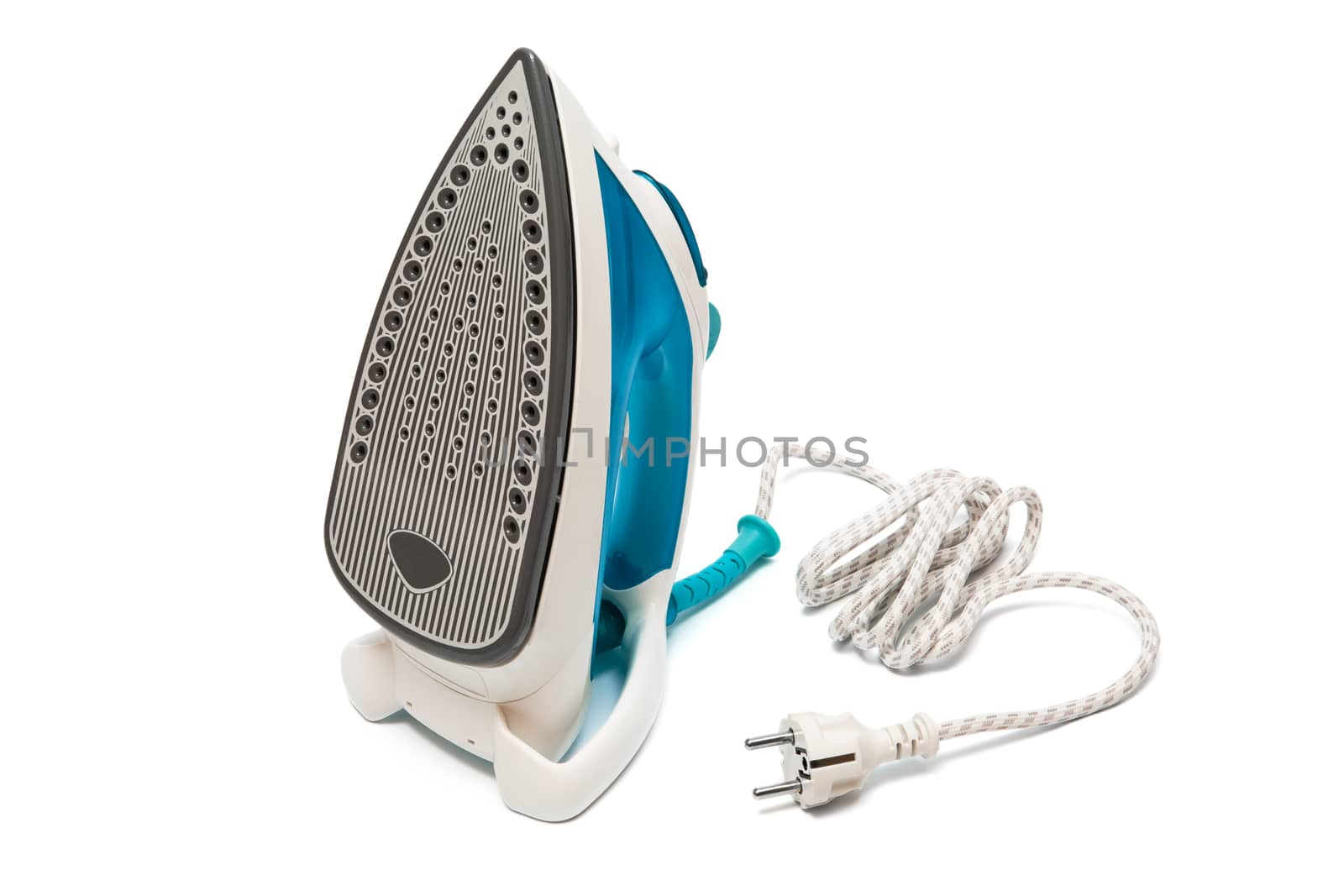 Modern electric iron on a white background