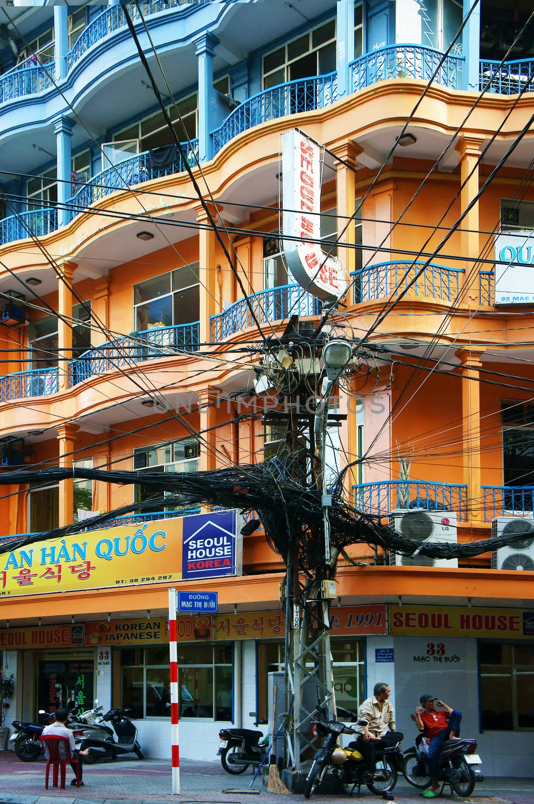HO CHI MINH CITY, VIET NAM- OCTOBER 24: Colorful house of city and electric wire network in Sai Gon, VietNam on October 24, 2013