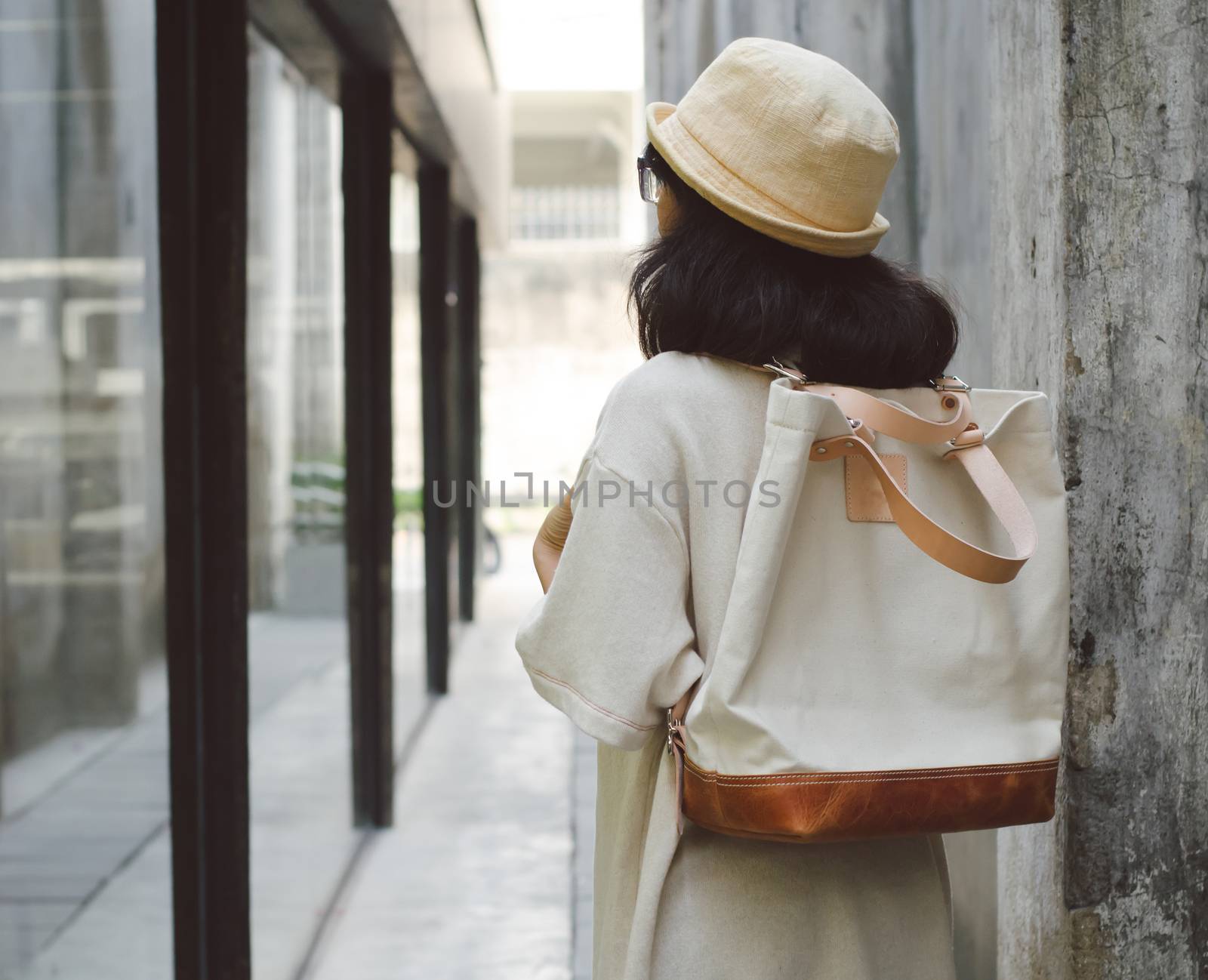 Young woman with a canvas bag, retro filter