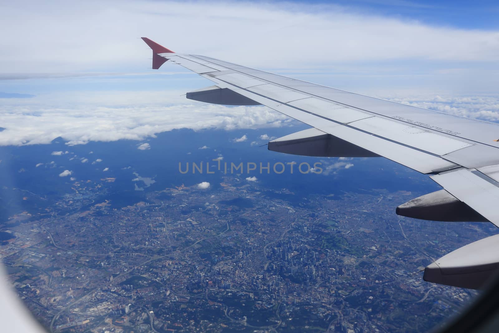 view from the airplane window, cloudy day