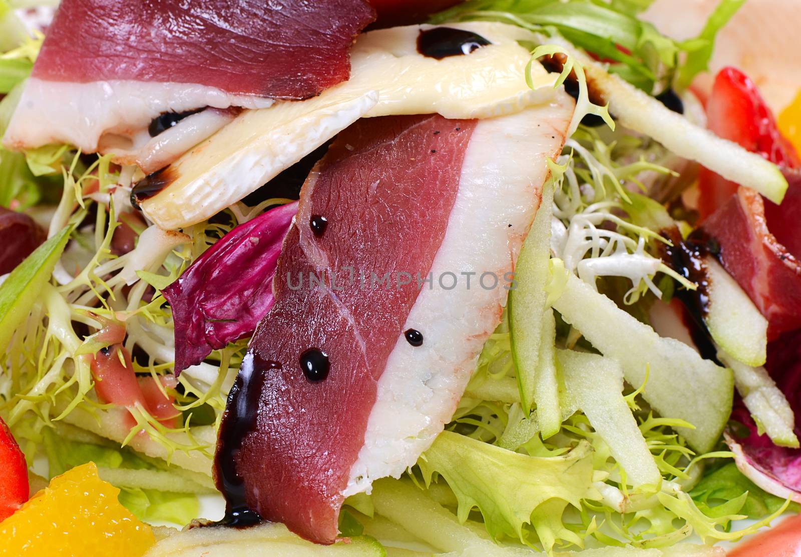 Salad with smoked duck breast  cloce up