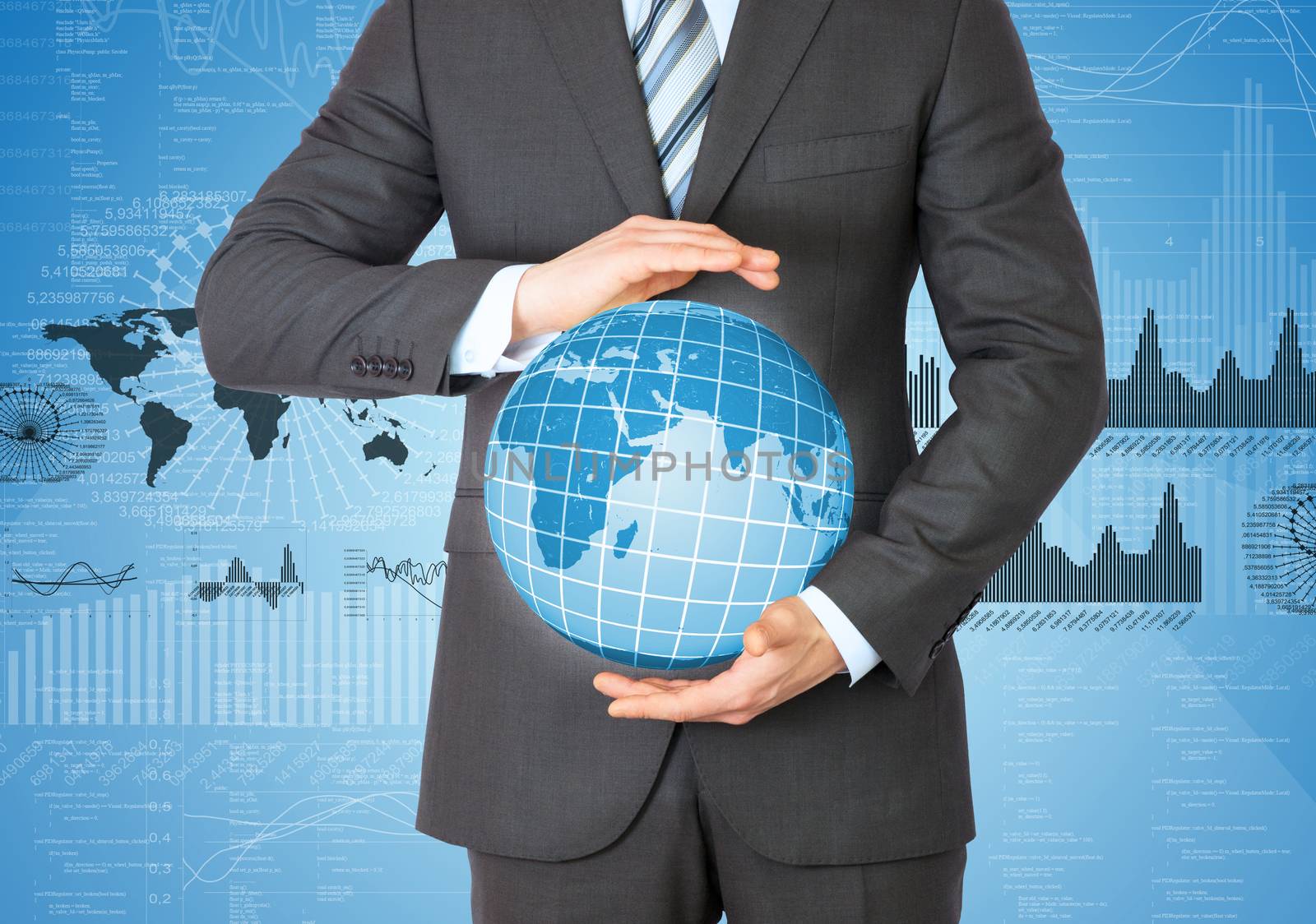 Businessman in a suit holding a globe. Graphs and figures on background