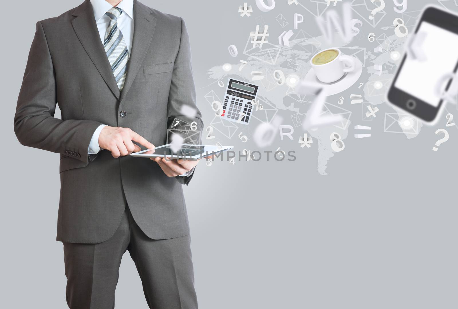 Man in suit holding tablet pc. Office work concept by cherezoff