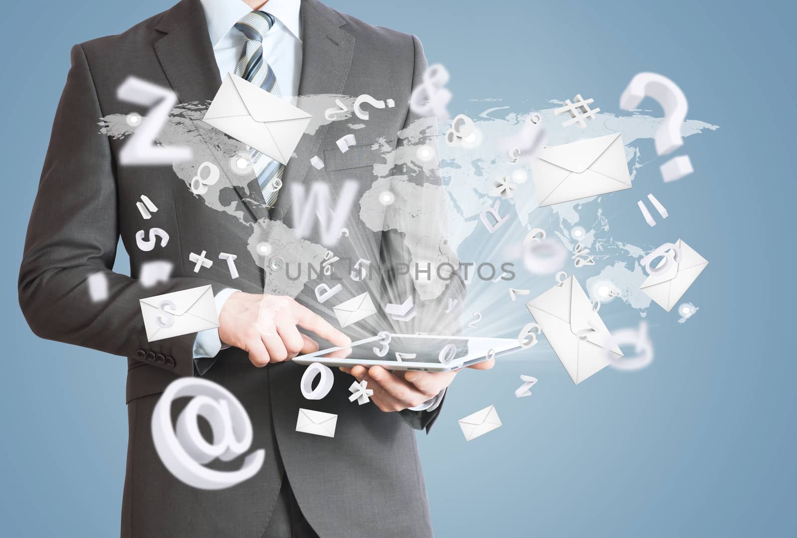 Man in suit holding tablet pc. Mailing concept by cherezoff