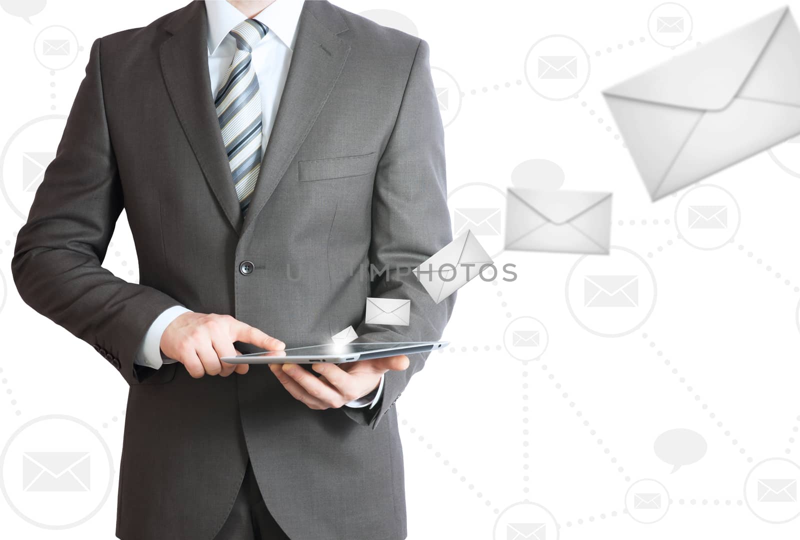 Man in suit holding tablet pc. Mailing concept by cherezoff