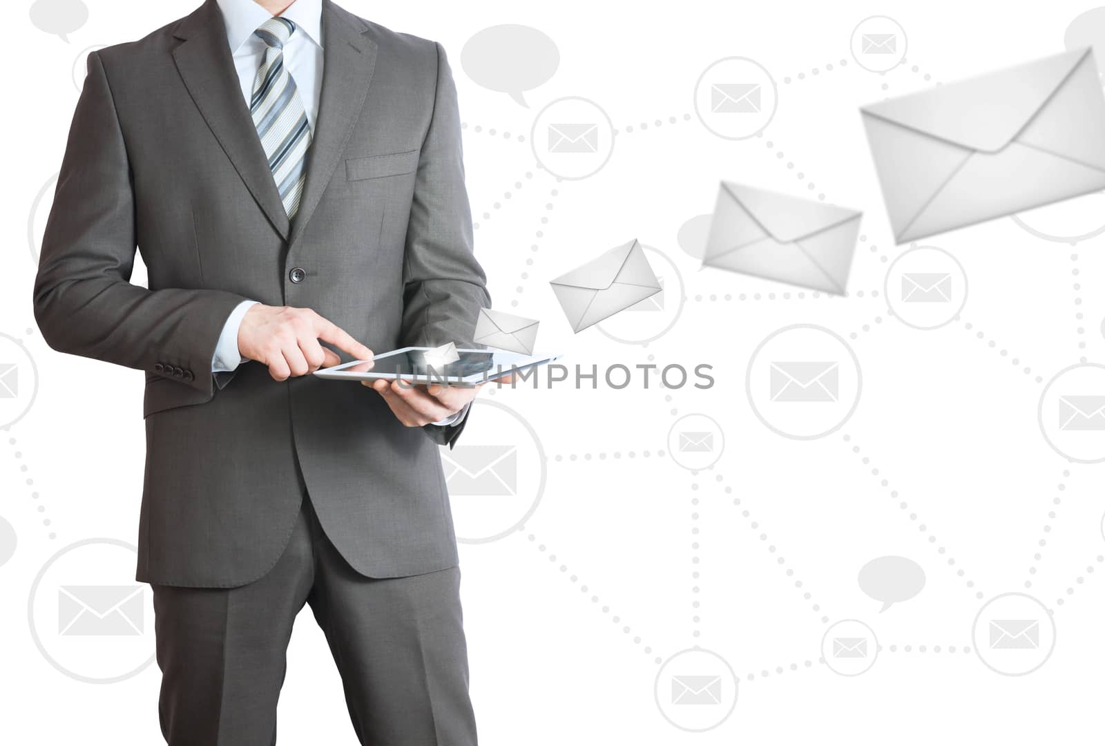 Man in suit holding tablet pc. Envelopes are emitted from the screen tablet. The concept of mailing