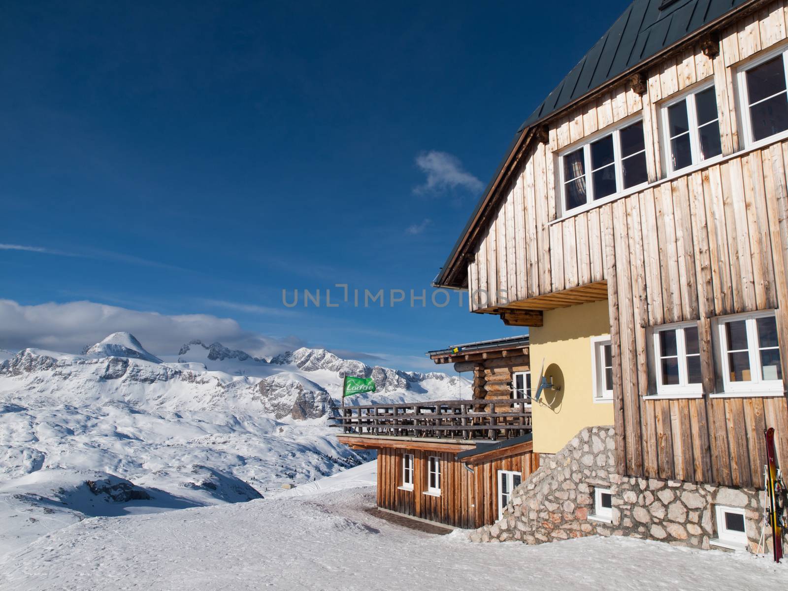 Mountain hut in winter time by pyty