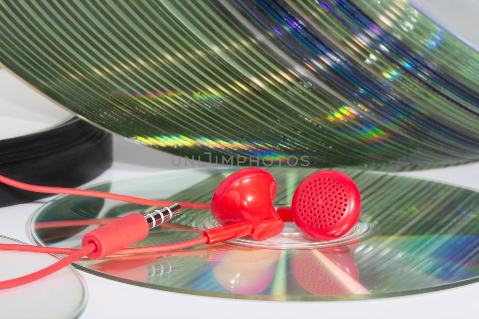 music CDs and stereo headphones by Olvita