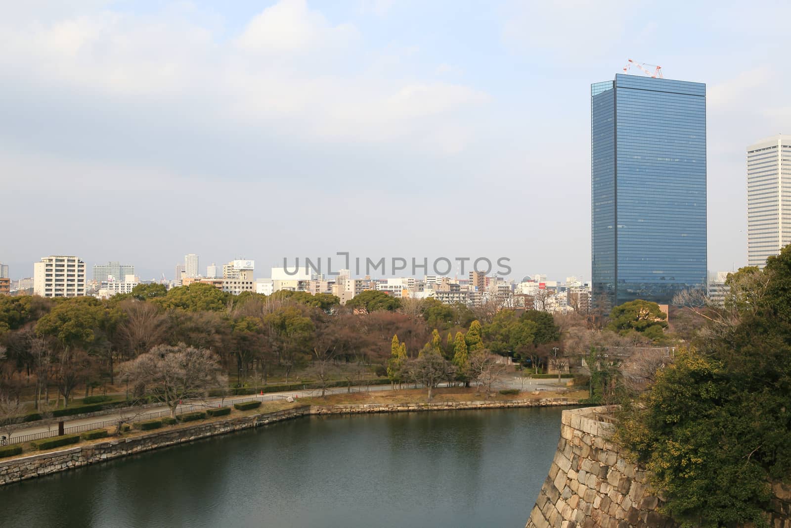 a wide view of osaka city on top of osaka castle