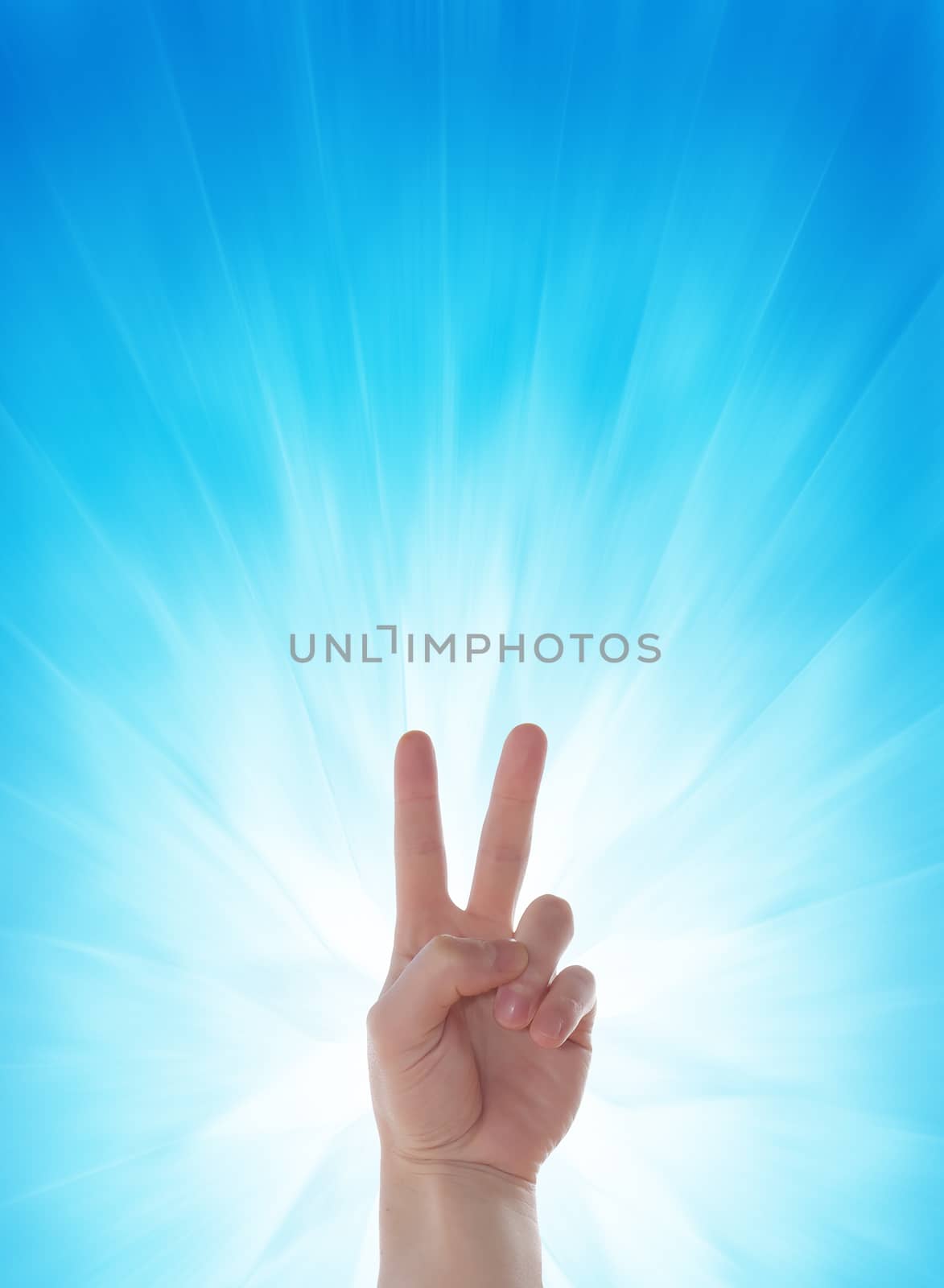 hand win gesture on blue background