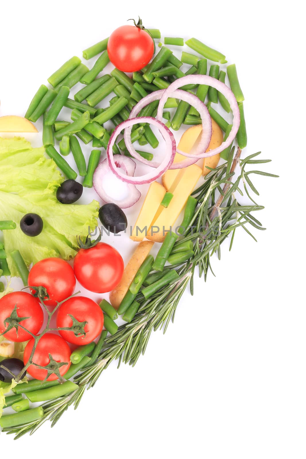 Heart shape of various vegetables and herbs. Isolated on a white background.