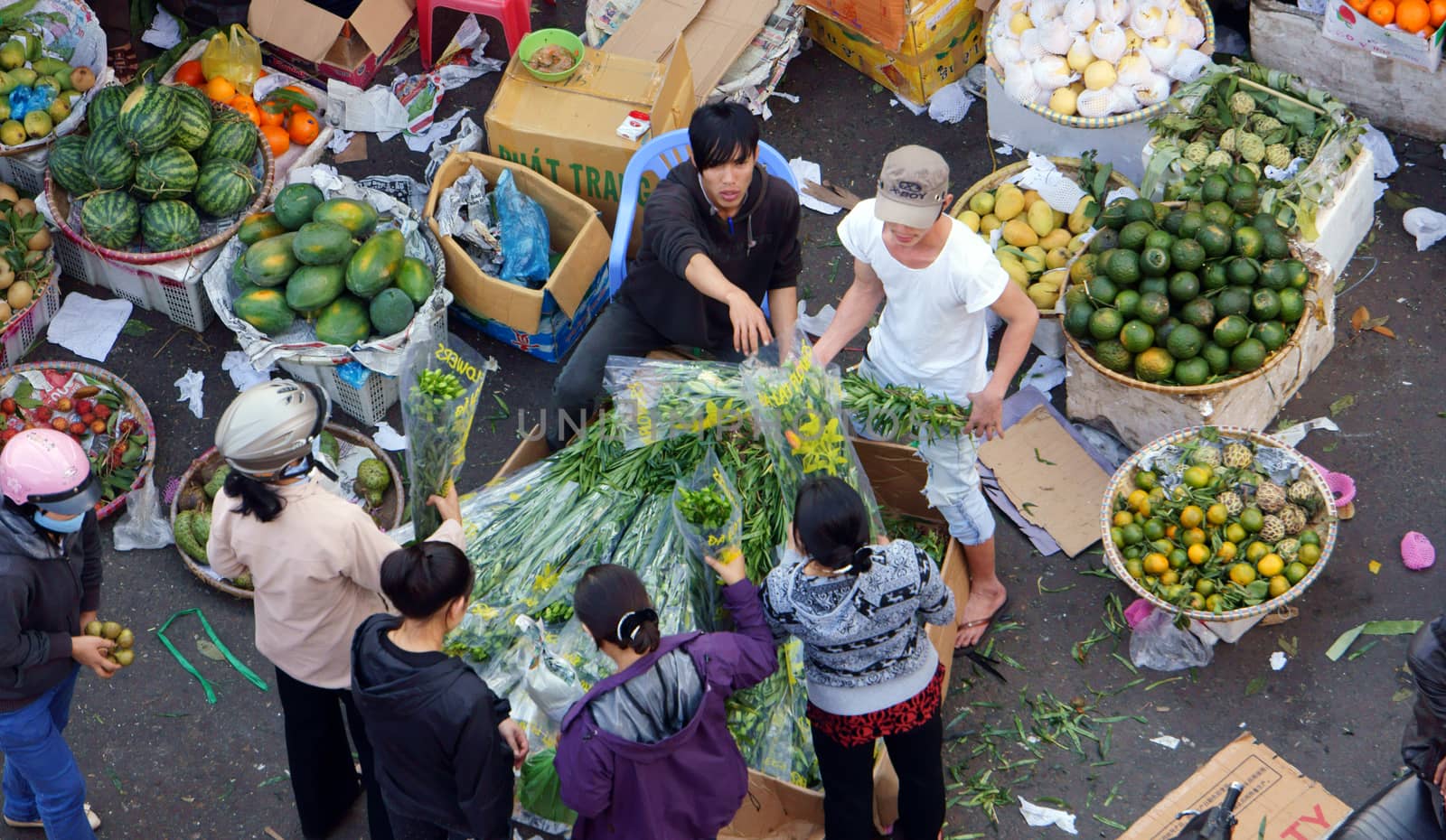 DA LAT, VIET NAM- FEBRUARY 8. People at farmers market in  Dalat, Viet Nam- February 8, 2013