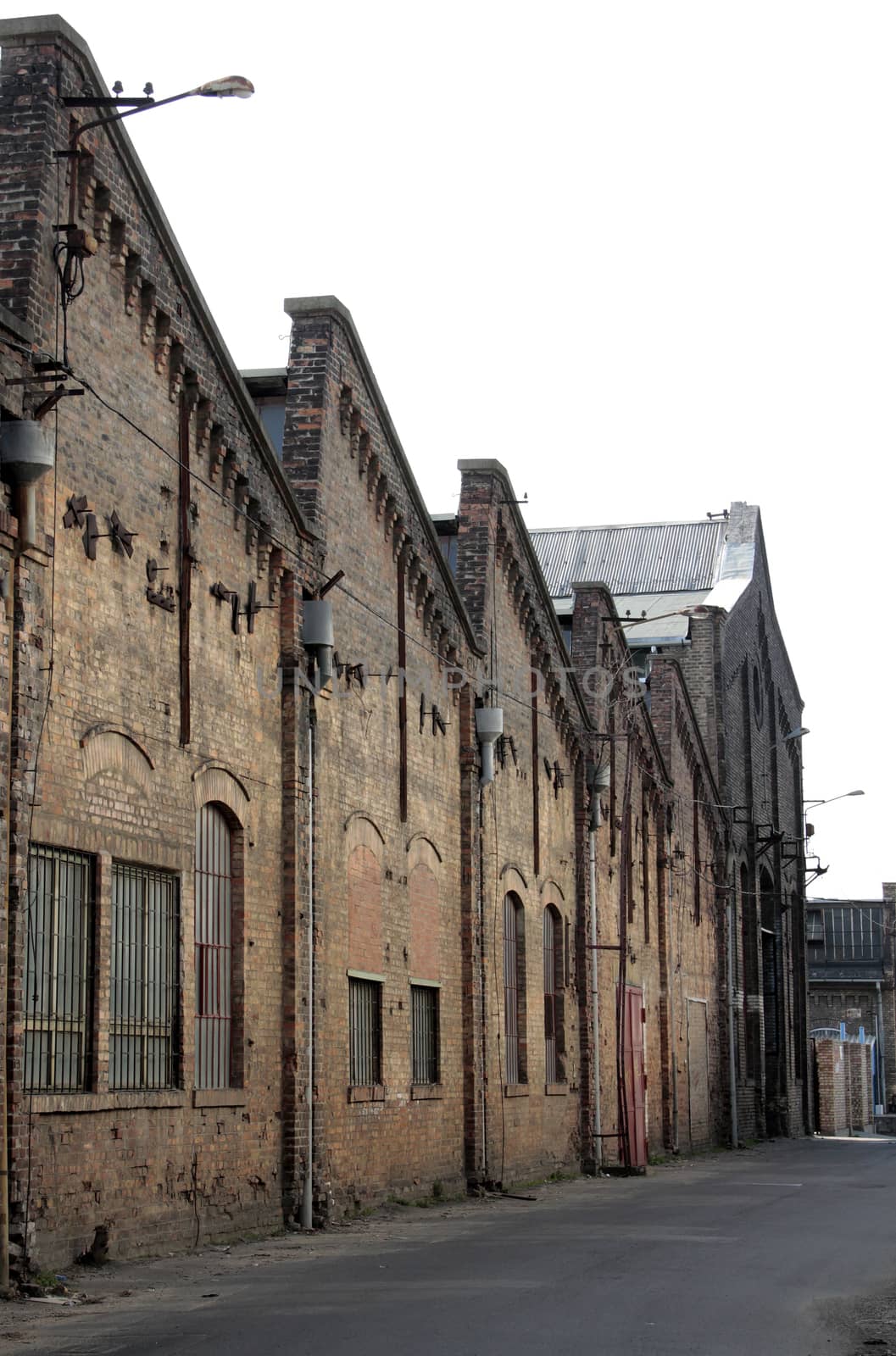 Detail of an old decrepit abandoned factory street.